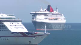 Cunard's Luxury liner Queen Mary 2 arrives at Weymouth Bay as coronavirus puts cruise holidays on hold