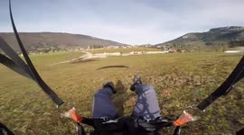 Daredevil paraglides only inches from the ground in French mountains