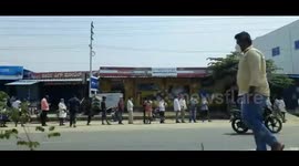 Thousands of Indians queue up outside liquor shops⁠ as sales resume