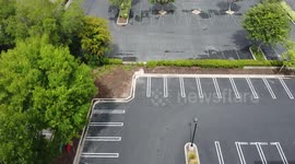 Empty parking lot at corporate building