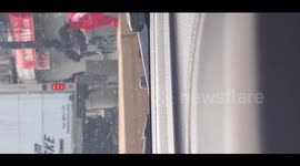 Funeral Home stacking dead Covid-19 bodies in an unfrigirated rental truck 2 of 4