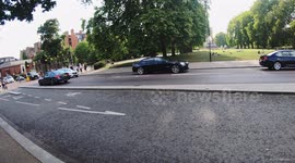 Man sneakily drops phone he was talking on whilst driving