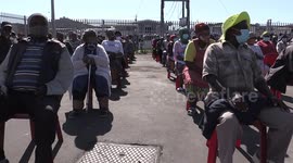 South Africa police help struggling Cape Town elders with food parcels