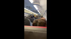 Footage shows packed American Airlines flight during COVID-19 pandemic