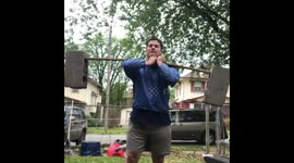 Lifting a bar with bricks from a baseball player