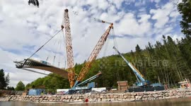 Watch this massive crane lift Britain's first stainless steel bridge into place