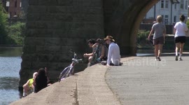 Groups of people flock to popular riverside destination despite coronavirus lockdown, Nottingham, UK
