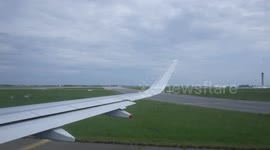 Airplane taking off Charles de Gaulle Airport in Paris, France