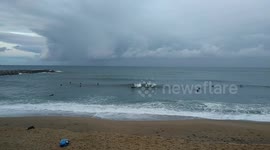 Surfers return to Barcelona's beaches as lockdown is slowly lifted