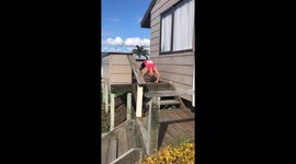 Maia lewis from New Zealand does ‘The Grudge’ walk down the stairs