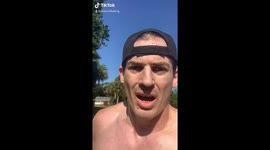 'What's up with Ahmaud then?' White man runs with TV in hand to expose motives behind Arbery's death