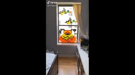 Chicago neighbours have a post-it window art battle during lockdown