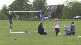 Friends meet up in the park after lockdown while their kids play