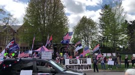Anti-lockdown protesters filled the sidewalks in front of Minnesota Governor Tim Walz's home