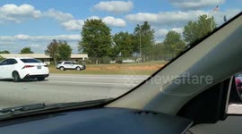 Jeep Wrangler flipped on freeway with cops