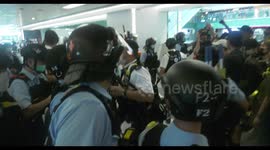 Tense scenes as Hong Kong protesters rally in shopping mall
