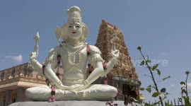 Shiva Statue In Front of Temple