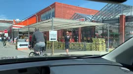Canadians lineup outside a Home Depot in Montreal