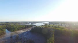 Drone footage shows extensive damage from failed Michigan dam