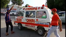 Ambulances rush to scene of Karachi plane crash