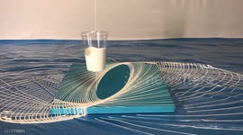 Artwork created using method of dripping pendulum on canvas