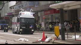 Hong Kong police use water cannon to disperse protesters from flyover