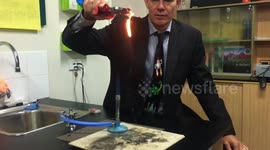 Australian science teacher burns plastic cup to make awesome dripping balls of fire
