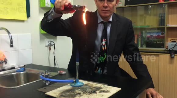 Australian science teacher burns plastic cup to make awesome dripping balls of fire
