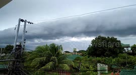 Imposing row of 'roll clouds' form over homes in the Philippines