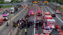 Onlookers watch as two women rescued from overturned car in Brooklyn