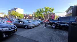 May 26th, Queens, New York - As New York begins opening, Bel Aire Diner in Astoria drew a crowd of vehicles and onlookers at the first drive-in Comedy show in New York. In place of laughter and applause, attendees honked their horns to show their support
