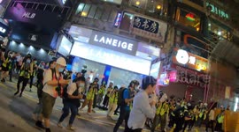 As legislator Ted Hui attempts to negotiate with riot police, protesters set up fire with explosive materials