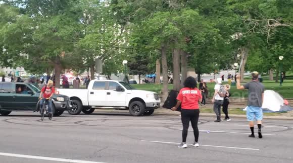 Tensions as Denver protesters block traffic in protest against George Floyd death