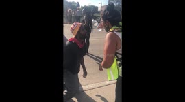 Volunteers and fellow protestors help provide aid to those maced by police after a tanker truck drove into a crowd of protestors in Minneapolis