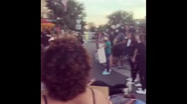 Police officers hug protesters at rally in Goldsboro, North Carolina