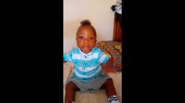 Baby enjoying himself.