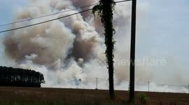 Raging fire and billowing smoke fills the sky!