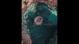 Floating in a natural pool