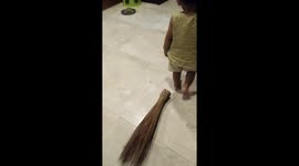 Funny Video A broom stucked in baby's leg.