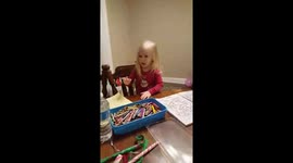 Toddler with white crayon that doesn't work