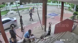 Thai policeman falls through station ceiling after roof collapses