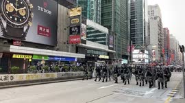Police marching on the street after the clearing operation on 20 October 2019