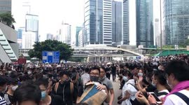 Protestors cheering to those who were carrying water to frontline protestors at the Anti-Extradition Bill protest on 12 June 2019