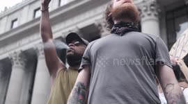 A crowd is protesting on the streets of new York.