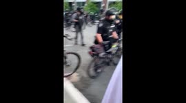 Seattle Police push protesters into gas and flashbangs