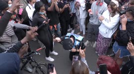 Crowd calls for police officer to kneel at Oxford anti-Rhodes protest