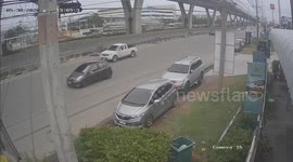 Hundreds of bank notes fall from motorcycle rider's bag