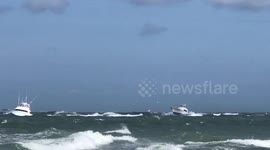 Boat damaged in rough seas Beaufort inlet North Carolina