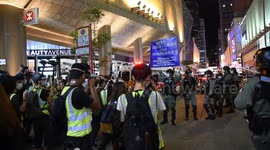 Riot police deploys blue flag in Mongkok, as Hong Kong protesters try to celebrate 12 June 2019