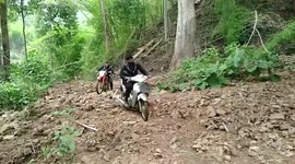 Village battered by rocks from mountain flash flood in northern Thailand